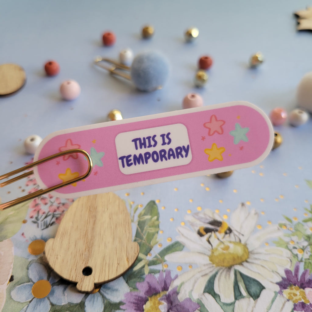 THIS IS TEMPORARY Band Aid